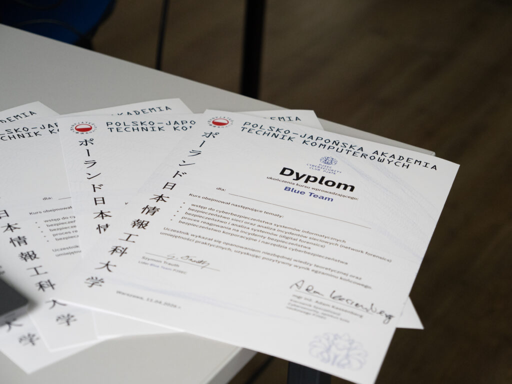 Blue Team course completion certificates laid out on the table, attesting to the skills acquired in the field of cybersecurity.