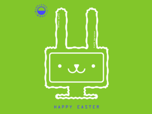 A green background with a minimalist white line illustration of a bunny shaped like an electrical plug, featuring a simple smiling face. Vertical text on the ears reads “PJAIT Gdańsk” and “PJAIT Warsaw.” The PJAIT logo appears in the top left, and “HAPPY EASTER” is written at the bottom in blue.