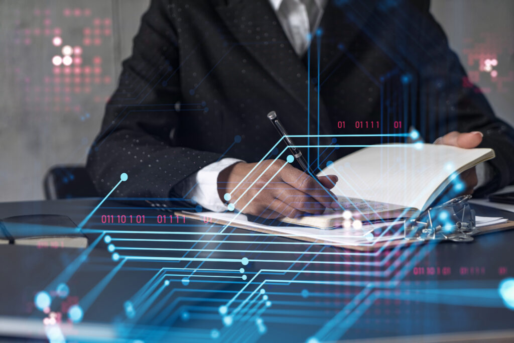 Businesswoman is writing down some ideas to create innovative software to change the world and provide a completely new service. Close up shot. Hologram tech graphs. Concept of Dev team. Formal wear.